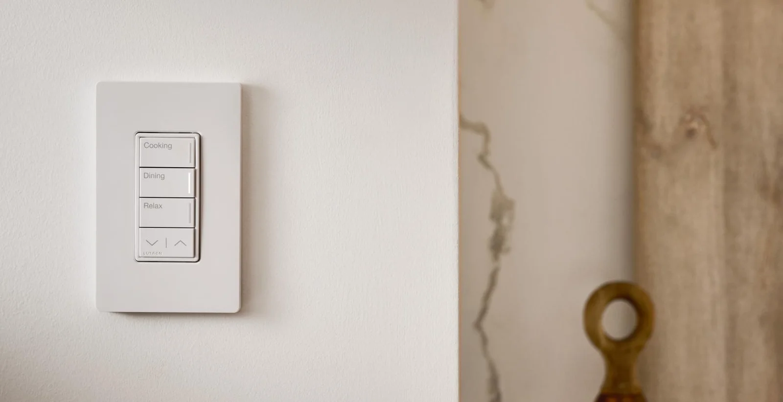 White Lutron keypad with Cooking, Dining, and Relax scene buttons