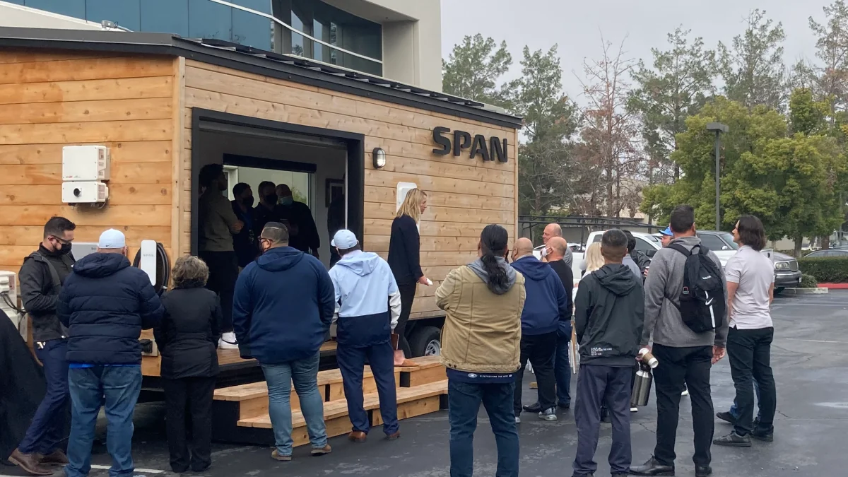 SPAN Mobile Home training setup with product demonstration screens